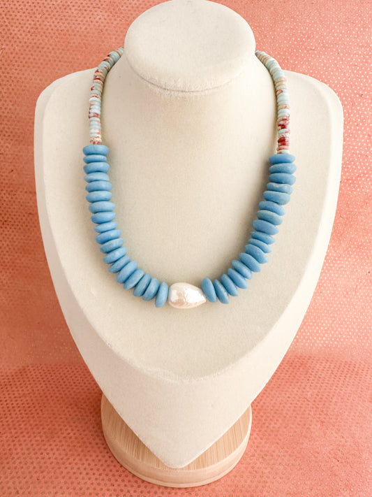Beachy, boho necklace with oversized pearl and glass saucer beads.